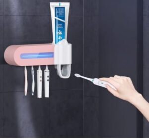 Dozator pasta de dinti cu sterilizator pentru periute